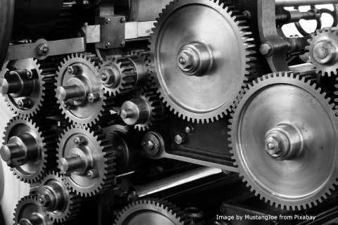 The image depicts several various cogs, gears, and motors working in tandem with the title: Beckhoff Automation Servo Motors: Precision and Performance in Motion Control